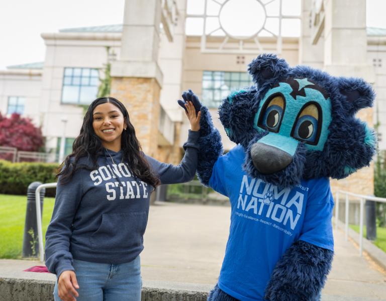 Student with Lobo, SSU's mascot